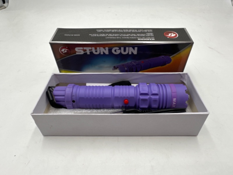 Photo 1 of STUN GUN LED FLASHLIGHT RECHARGEABLE BATTERY POWERFUL NEW