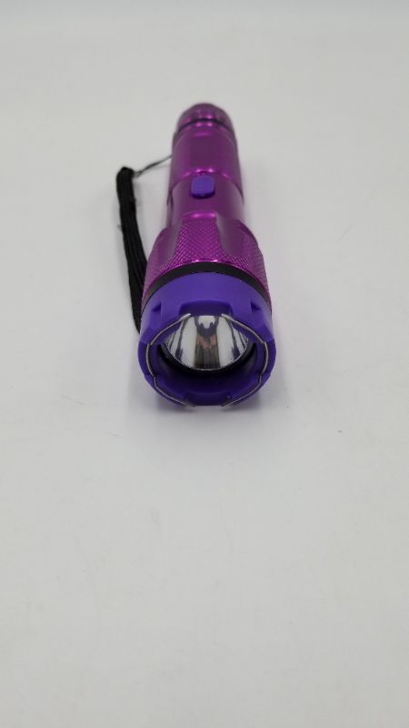 Photo 2 of PURPLE SELF DEFENSE FLASHLIGHT ALLMINUM LIGHT WEIGHT BODY RECHARGEABLE BATTERY NEW 