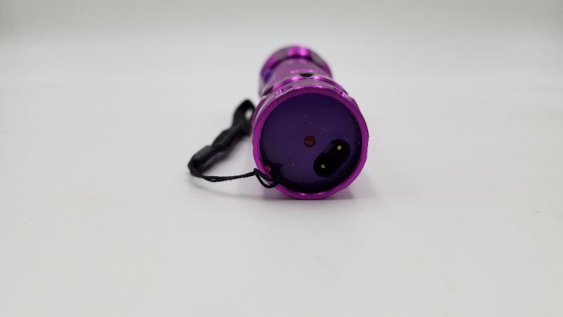 Photo 3 of PURPLE SELF DEFENSE FLASHLIGHT ALLMINUM LIGHT WEIGHT BODY RECHARGEABLE BATTERY NEW 