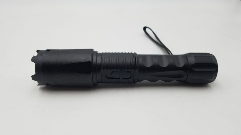 Photo 1 of SELF DEFENSE STIN GUN LED FLASHLIGHT ALUMINUM LIGHT WEIGHT BODY 1 CAR CHARGER 1 WALL CHARGER AND A HOLSTER NEW 