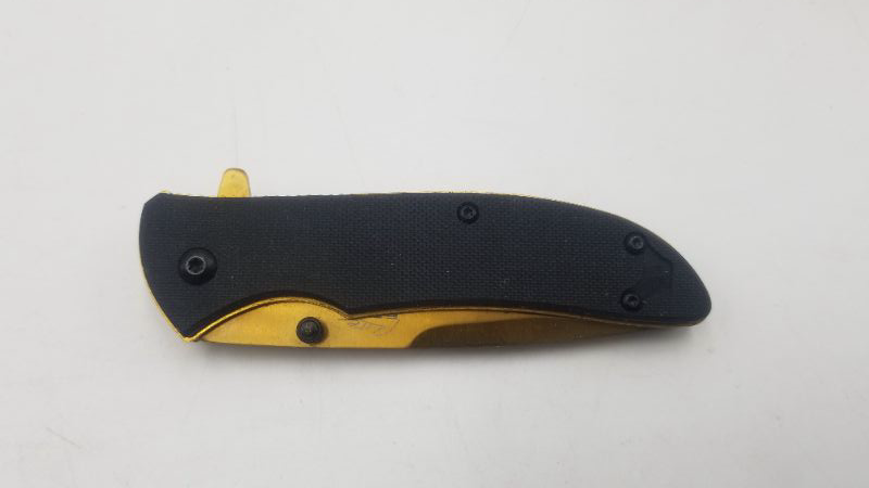 Photo 3 of GOLD AND BLACK POCKET KNIFE NEW 