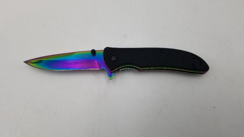 Photo 1 of OIL SLICK POCKET KNIFE WITH BLACK HANDLE NEW 