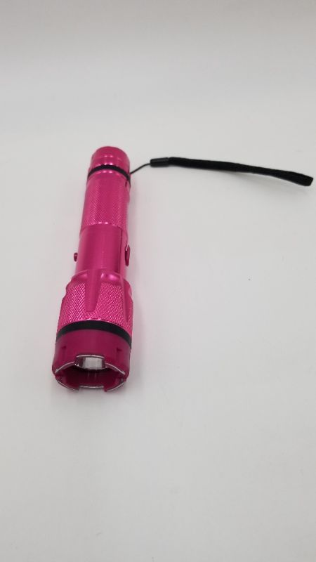 Photo 2 of PINK FLASHLIGHT AND TASER WITH CARRY CASE NEW 