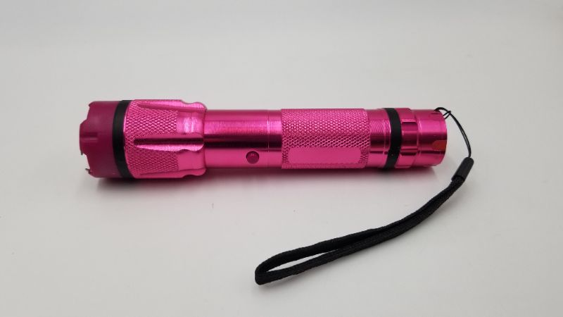 Photo 1 of PINK FLASHLIGHT AND TASER WITH CARRY CASE NEW 