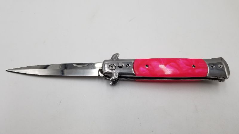 Photo 1 of 3.5 INCH STILETTO PINK POCKET KNIFE WITH SAFETY SWITCH NEW 
