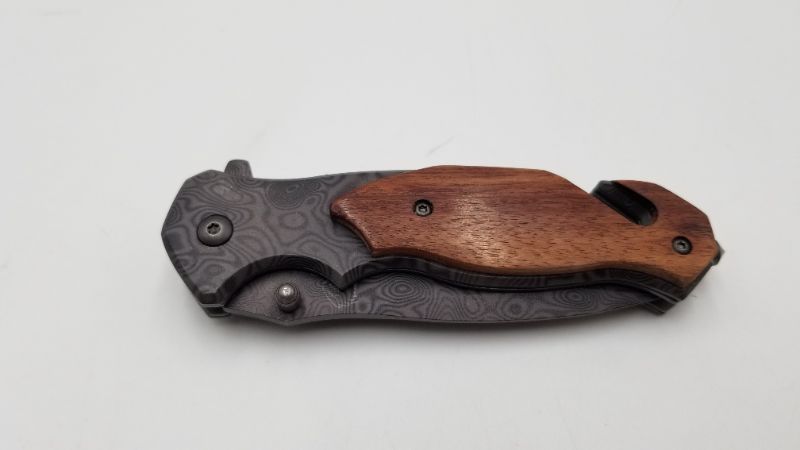 Photo 1 of 3.25 INCH GROOVY BLADE WOOD HANDLE SEATBLET CUTTER AND WINDOW BREAKER NEW 

