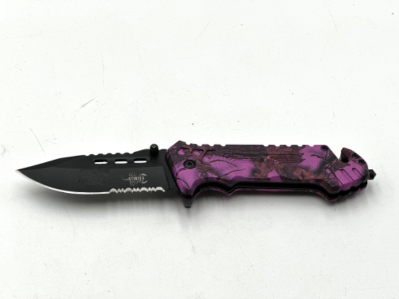 Photo 1 of PINO CAMO PRINT STINGER KNIVES POCKET KNIFE WITH WINDOW BREAKER AND SEAT BELT CUTTER NEW