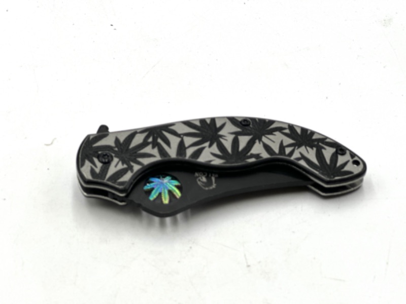 Photo 2 of BLACK AND SILVER HEMP FLOWER DESIGN POCKET KNIFE NEW