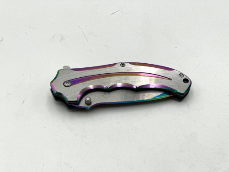 Photo 2 of OIL SLICK AND SILVER FALCON POCKET KNIFE NEW 