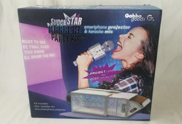 Photo 1 of SUPERSTAR KARAOKE MICROPHONE AND SMART PHONE PROJECTOR 