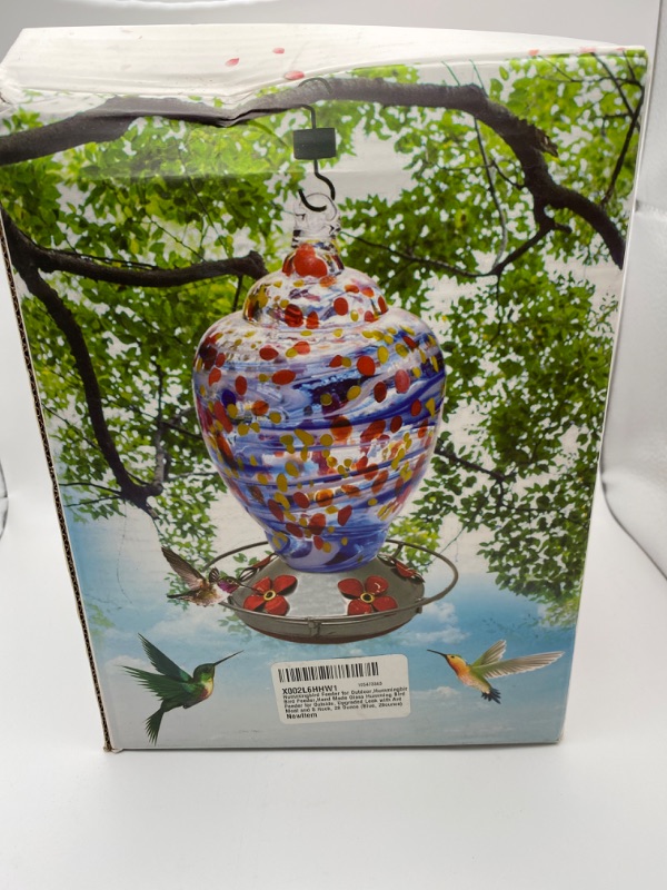 Photo 3 of Hummingbird Feeders for Outdoors, 28 Ounces Hand Blown Glass Hummingbird Feeder with Upgraded Leak Proof Round Metal Stand, Wild Bird Feeder for Outside Garden Yard. Ant Moat, Hook and Brush Included