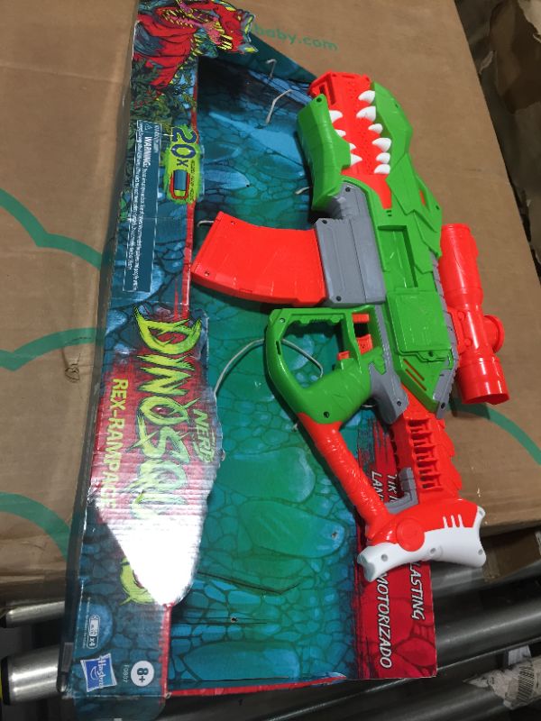 Photo 2 of NERF DinoSquad Rex-Rampage Motorized Dart Blaster, 10-Dart Clip, 10-Dart Storage- T-Rex Dinosaur Design
