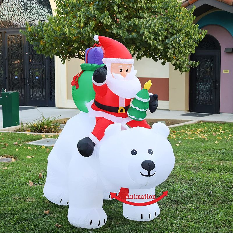 Photo 1 of GOOSH 6 FT Length Christmas Inflatables Outdoor Santa Clause Riding The Polar Bear with Shaking Head, Blow Up Decoration Clearance with LED Lights Built-in for Holiday/Christmas/Party/Yard/Garden