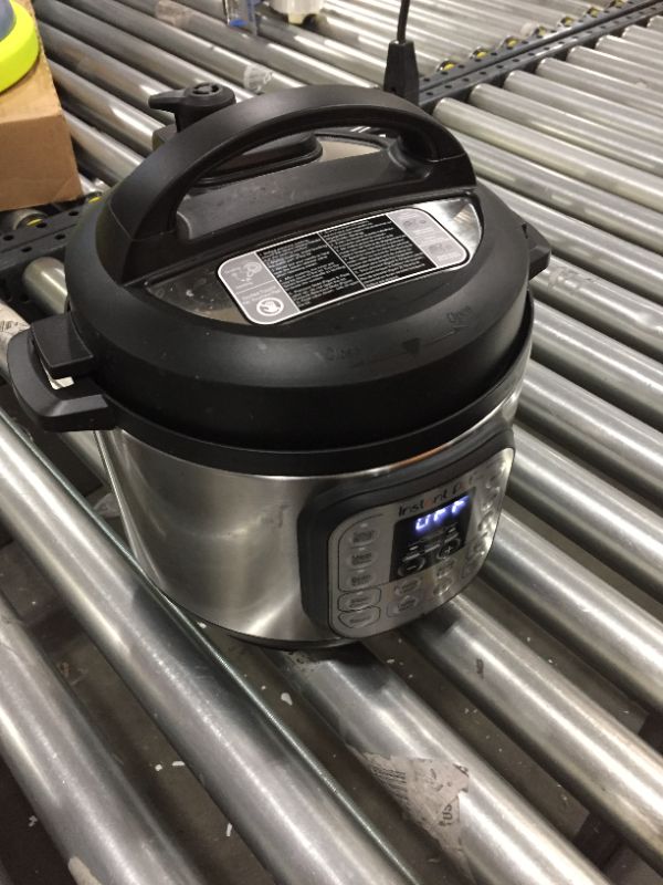 Photo 2 of Instant Pot Duo 7-in-1 Electric Pressure Cooker, Slow Cooker, Rice Cooker, Steamer, Sauté, Yogurt Maker, Warmer & Sterilizer, 3 Quart, Stainless Steel/Black
