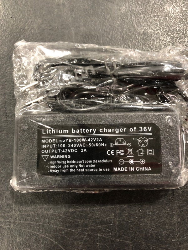 Photo 1 of LITHIUM BATTERY CHARGER, 36V, MODEL SZYB-100W-42V2A.