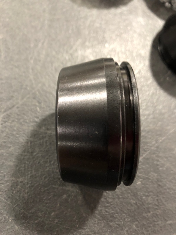 Photo 1 of CENTER CAPS, BLACK ANODIZED, SET OF 4, UNKNOWN APPLICATION.