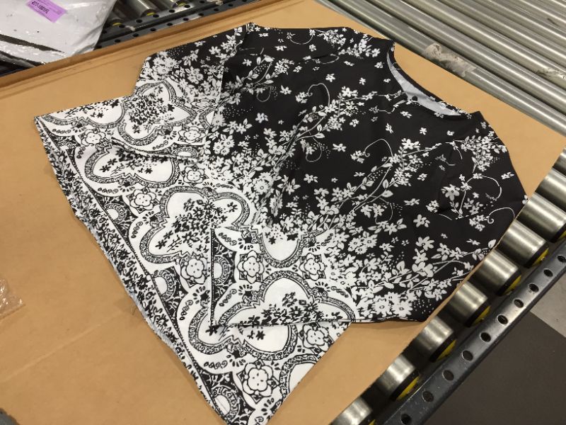 Photo 1 of SIZE LARGE WOMENS FLORAL BLACK AND WHITE TOP