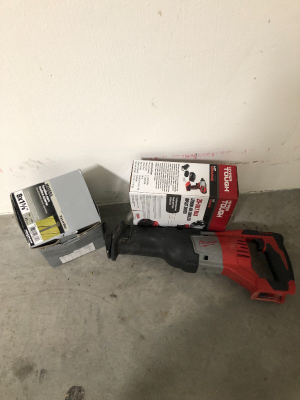 Photo 1 of Milwaukee impact driver and nail boxes with reciprocating saw 