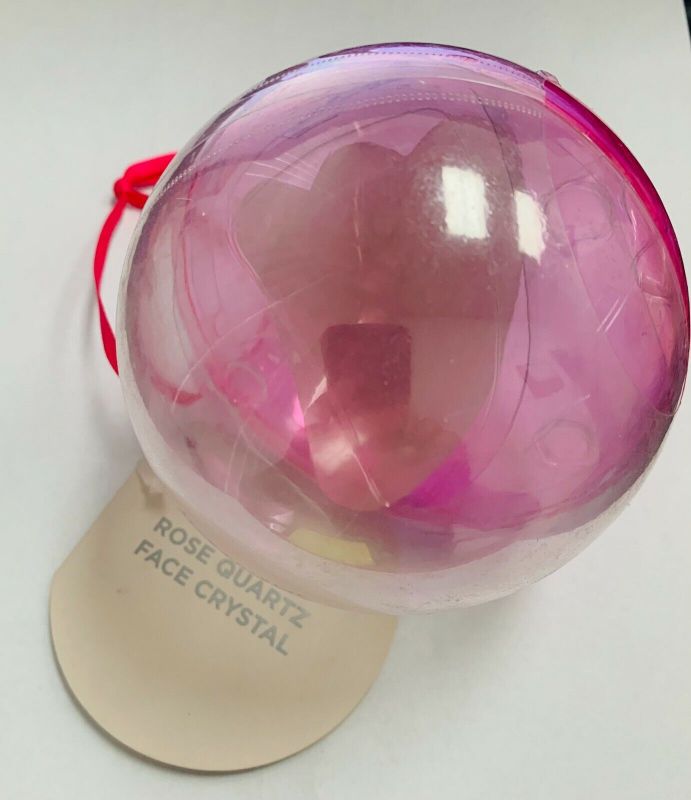 Photo 1 of MACYS Exclusive, TwelveNYC Beauty Ornaments Rose Quartz Face Crystal
Contains: 1 handheld  Rose Quartz Crystal
This handheld crystal may help reduce the appearance of puffiness