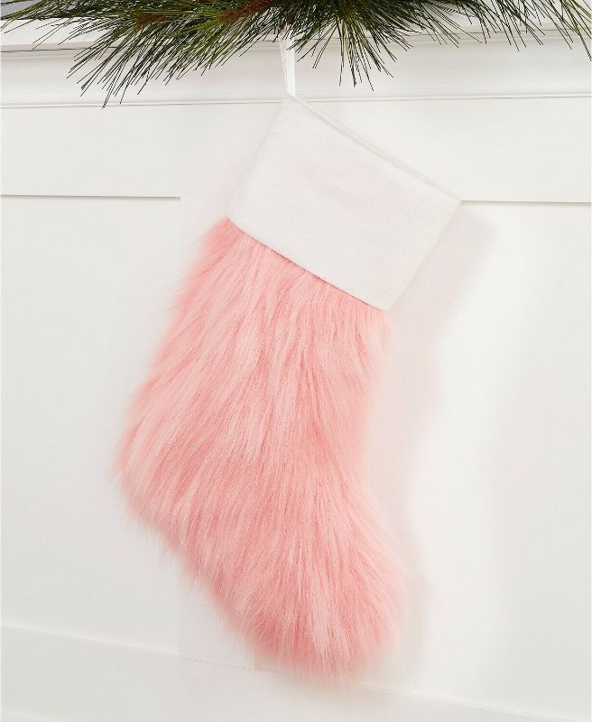 Photo 1 of Holiday Lane Plush Pink Faux Fur Stocking White Cuff