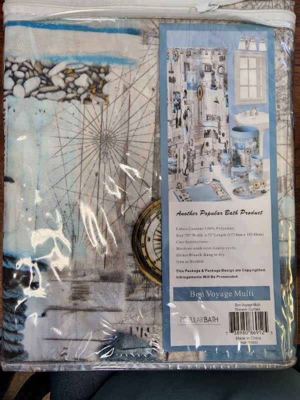 Photo 1 of Bon Voyage fabric shower curtain features a nautical theme.
70 x 72 inches. Standard size.
Pattern features lighthouses, ships, ship wheels, compasses, anchors and more.