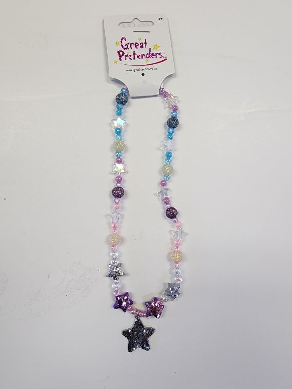Photo 1 of Great Pretenders star necklace. Fun and colorful necklace that is sure to catch attention.