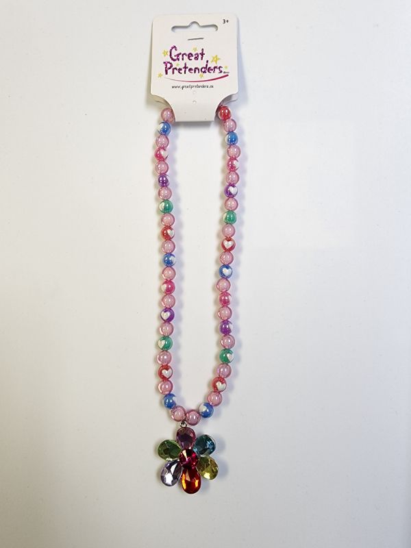 Photo 1 of Great Pretenders flower necklace. Fun and colorful necklace that is sure to catch attention.