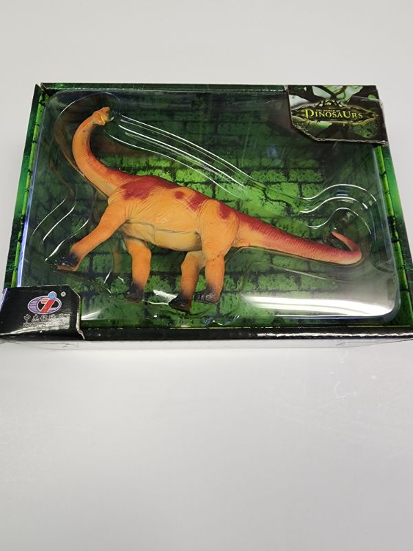 Photo 1 of The world of dinosaurs. 7" long