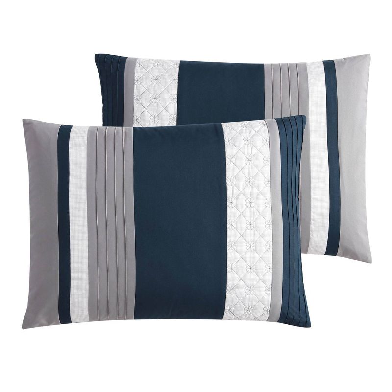 Photo 2 of Queen 7 pieces Crenshaw Comforter Set - Riverbrook Home. Embroidered Medallions Pieced with Color Banding in blue and gray
7 Piece Set includes 1 Comforter, 2 Shams, 1 Bedskirt, and 3 Bonus Embroidered Decorative Pillows. Embroidered and Quilted Pintuck T