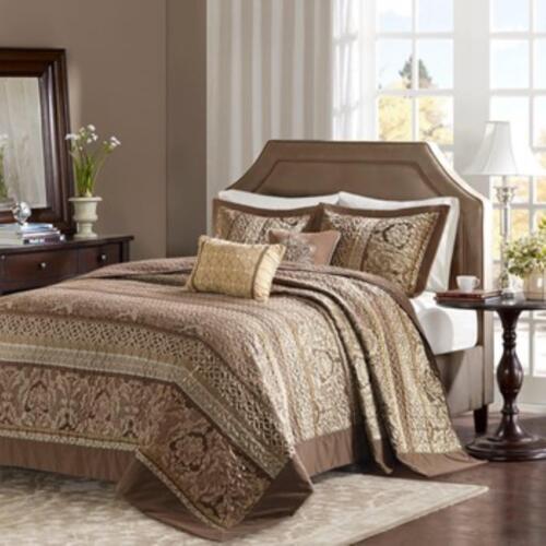 Photo 1 of Madison Park Venetian 5 Piece Reversible Jacquard Bedspread Set. The Madison Park Bellagio 5 Piece Jacquard Bedspread Set offers a luxurious update to your bedroom decor. Color: Brown/Gold - Material: Cotton - 1 Bedspread: 102"W x 118"L - 2 Standard Shams