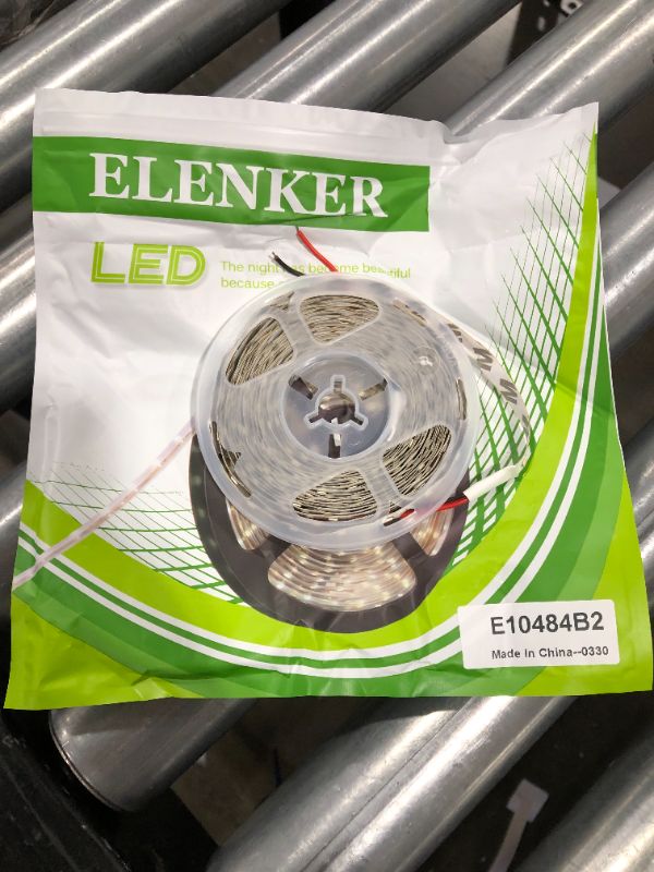 Photo 1 of ELENKER LED Strip Light Non-Waterproof SMD 3528 600LEDs 3000K 16.4Ft 5M DC12V - Power Supply Sold Seperately