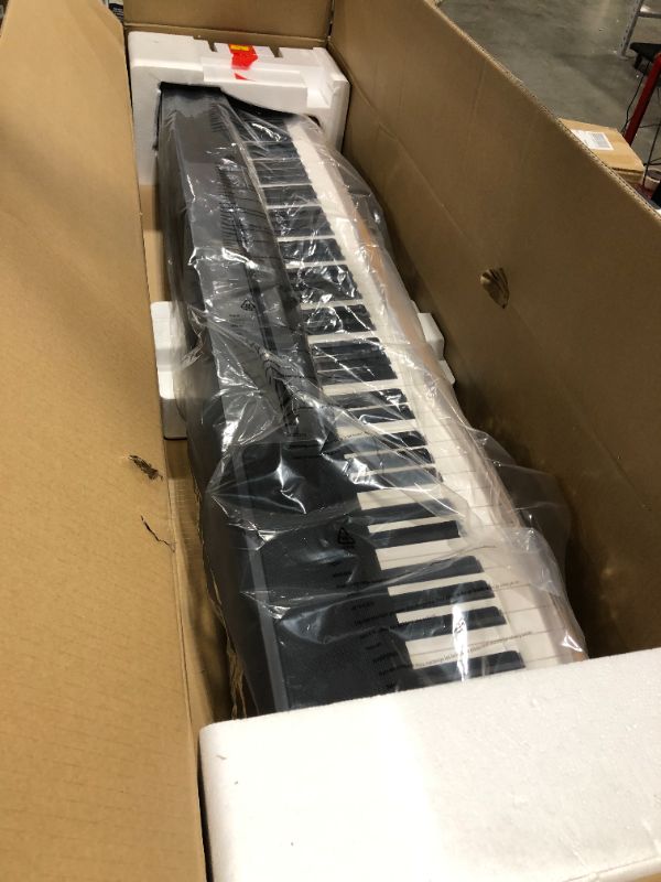 Photo 2 of Alesis Recital Grand - 88 Key Digital Piano with Full Size Graded Hammer Action Weighted Keys, Multi-Sampled Sounds, Speakers, FX and 128 Polyphony