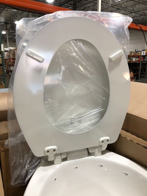 Photo 3 of Dometic 302310031 310 Series Standard Height Toilet 19.75" Height, Slow Close Wood Seat, White