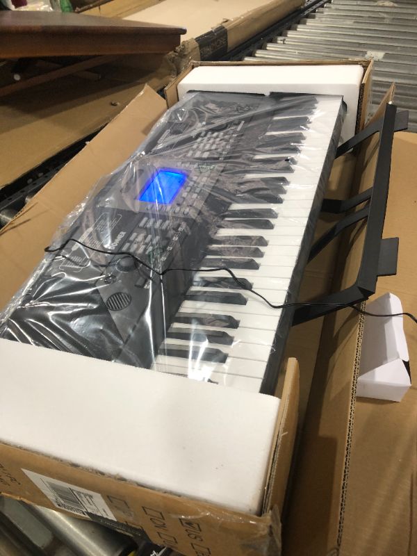 Photo 2 of Donner 61 Key Piano Keyboard, Keyboard Piano with Force Sensitive, MIDI Keyboard with Music Stand Power Adapter & Keyboard Sticker, Supports MP3/USB MIDI/Audio/Microphone/Headphones/Sustain Pedal
