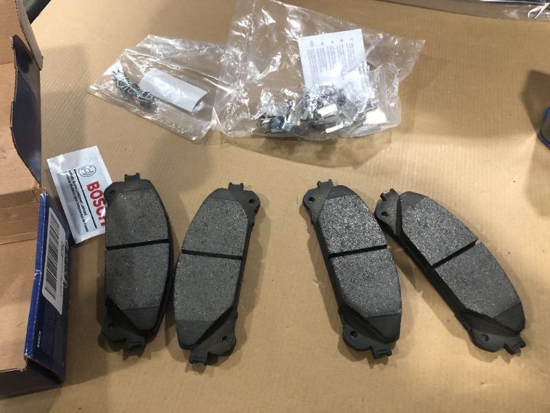 Photo 2 of Bosch BE1324H Blue Disc Brake Pad Set with Hardware for Select Lexus and Toyota Cars, SUVs, and Vans - FRONT
