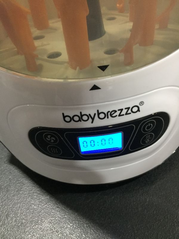 Photo 2 of Baby Brezza Electric Baby Bottle Sterilizer and Dryer Machine â?? Steam Sterilizer - Universal Fit Steamer - Sterilizes Pacifiers, Glass, Plastic, and Newborn Feeding Bottles
