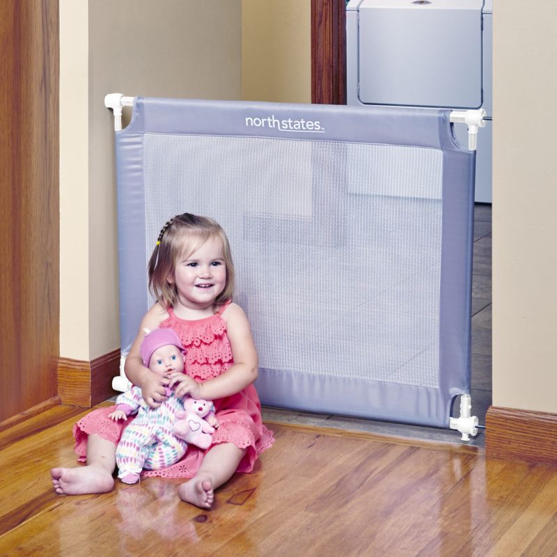 Photo 1 of Toddleroo by North States 42.6” wide Portable Traveler Baby Gate: Easy to install and folds up to fit in included travel bag. Pressure Mount. Fits 25.2" - 42.6" wide. (28” tall, Light Gray)
