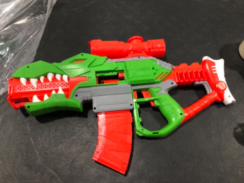 Photo 2 of Nerf DinoSquad Rex-Rampage Motorized Dart Blaster, 10-Dart Clip, 20 Nerf Darts
