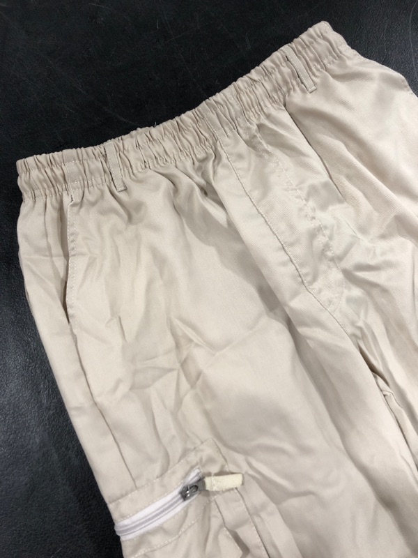 Photo 2 of WOMEN'S CARGO STYLE PANT, TAN, SIZE XL.