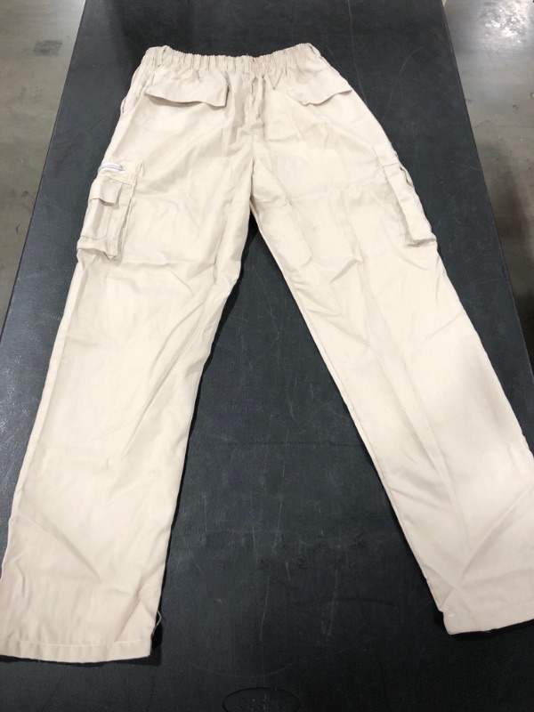 Photo 4 of WOMEN'S CARGO STYLE PANT, TAN, SIZE XL.