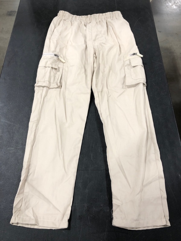 Photo 1 of WOMEN'S CARGO STYLE PANT, TAN, SIZE XL.