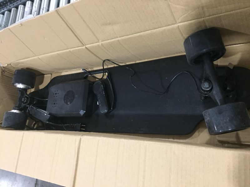 Photo 3 of Caroma 37" Electric Skateboard with Wireless Remote Control,700W Dual Motor Electric Longboard,E-Longboard with 3 Speed Adjustment,Portable E-Skateboard for Adults Kids,10-12 Miles Range
