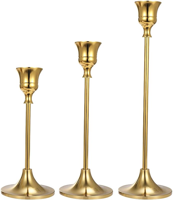 Photo 1 of Anndason Set of 3 Gold Candlestick Holders Gold Candle Holder Taper Candle Holders Candle Holder Decorative Candlestick Holder for Home Decor, Wedding, Dinning, Party, Anniversary 6.1''*2.63''(15.5cm*6.68cm), 7.36''*2.63''(18.7cm*6.68cm), 9.37''*2.63''(23