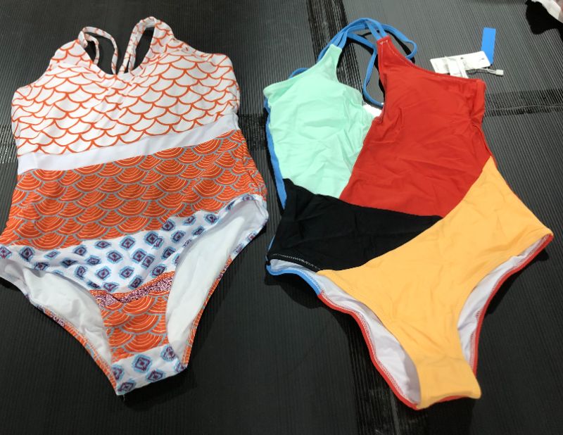 Photo 1 of 2 PACK BIKINIS
LEFT ONE IS MEDIUM
RIGHT ONE IS SMALL 