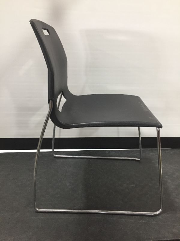 Photo 2 of Black Matte Plastic Chair 32H x 18W x 19L
