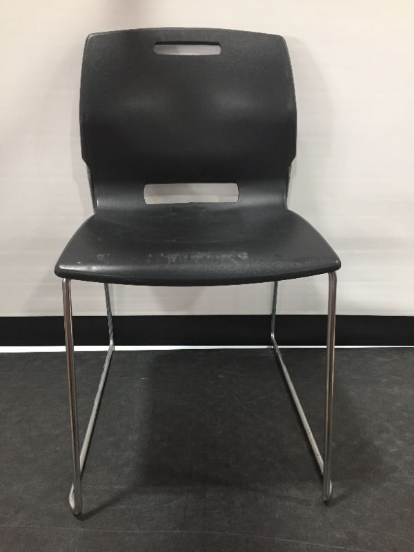 Photo 1 of Black Matte Plastic Chair 32H x 18W x 19L
