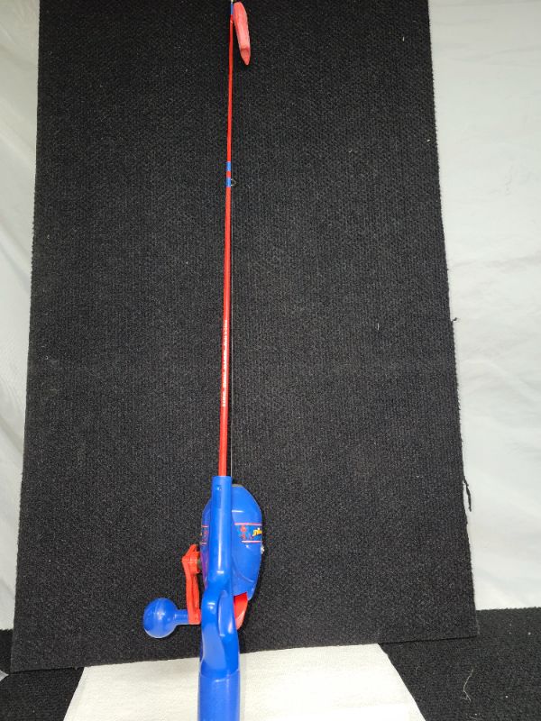 Photo 4 of Shakespeare Marvel Spider-Man Children's Fishing Pole All-In-One 
Rod Length: 21 3/8"
Overall Length: 30 1/4"