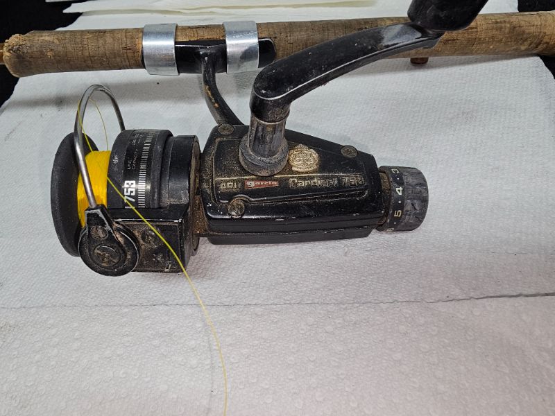 Photo 2 of Abu Garcia Spinning Reel and Vintage Rod
Overall Length: 50"