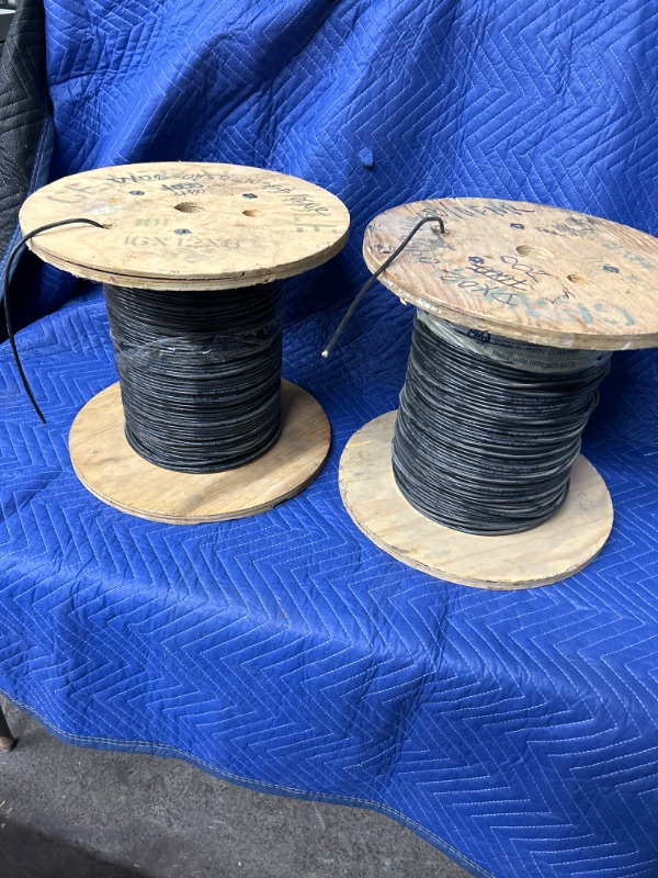 Photo 1 of 2 spools of Optical cable corporation OCC ultra fox riser dx02-0450-w. Unknown length one spool says 480 feet one spool says 700 feet unknown if these numbers are correct. Fiber cable 