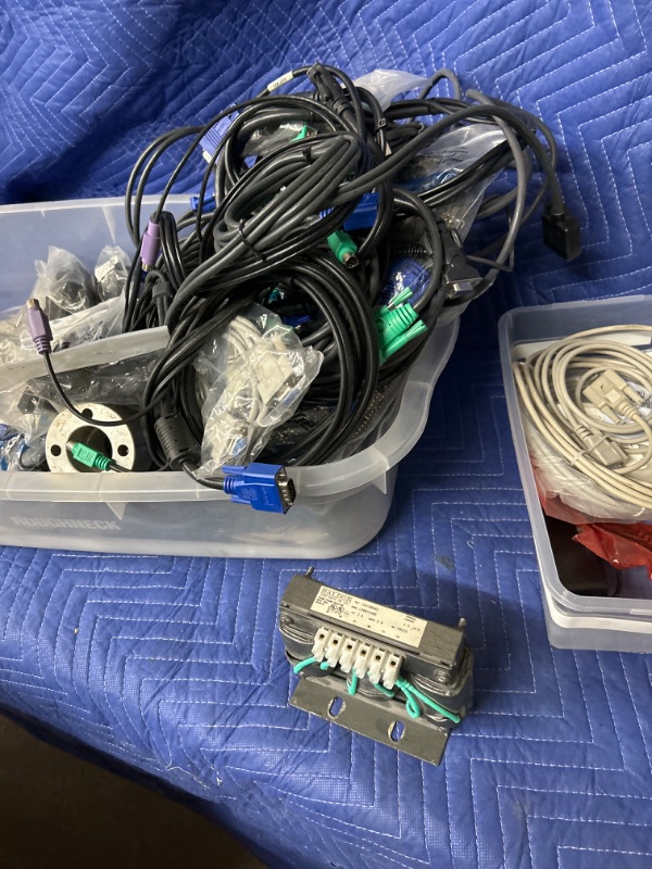 Photo 1 of plastic bin full of cables 
